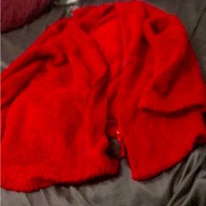 This is a red sweater and rarely used